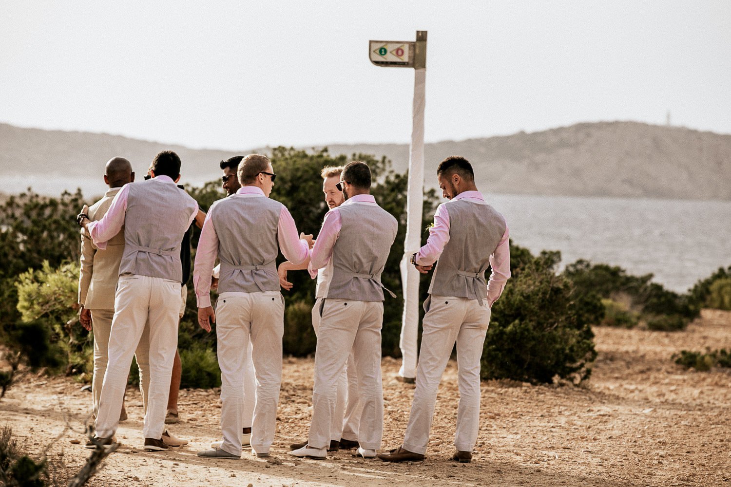 Mike and his friends overlooking the sea in Ibiza