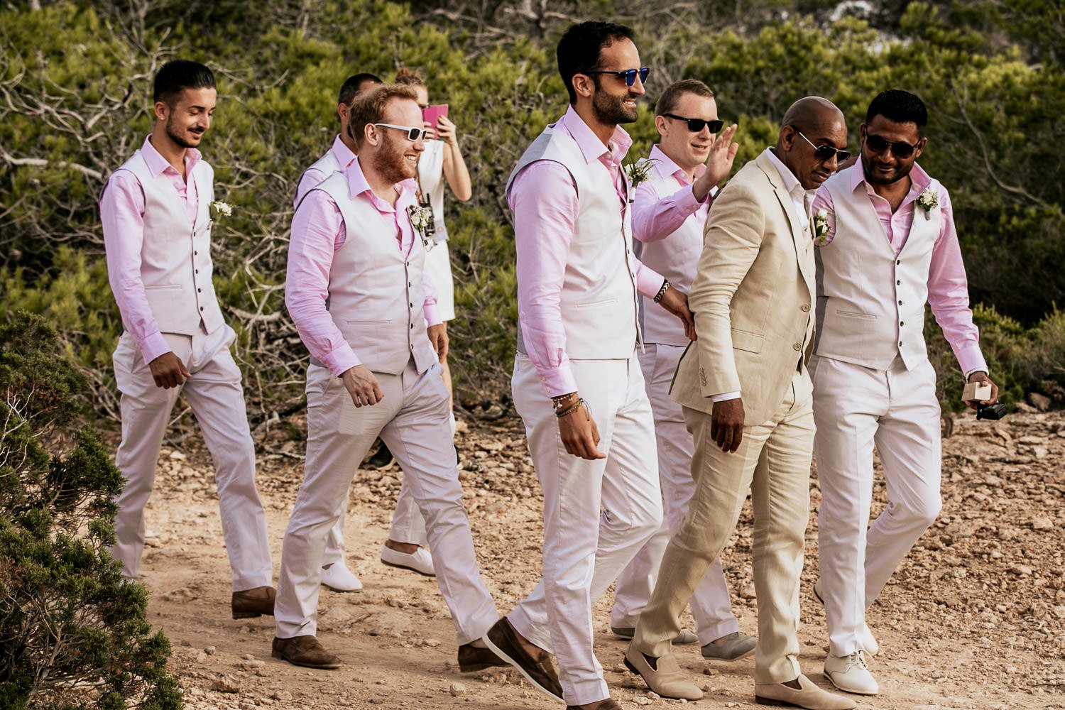Mike and his friends laughing on the way to the ceremony