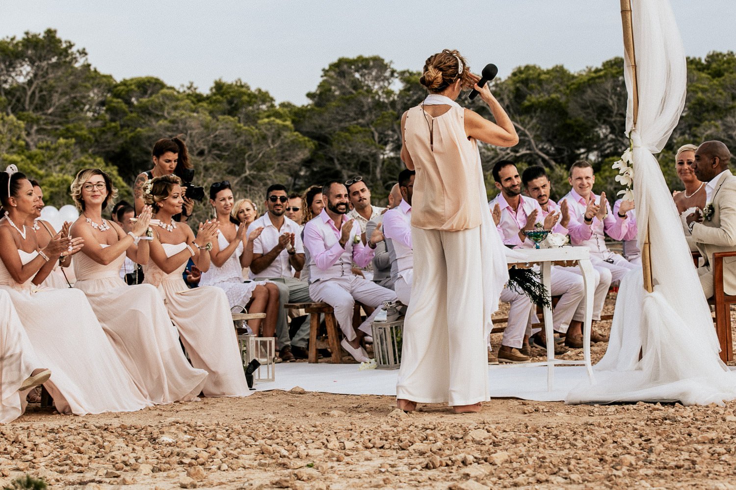 Mike and Monica embracing during their Ibiza wedding ceremony