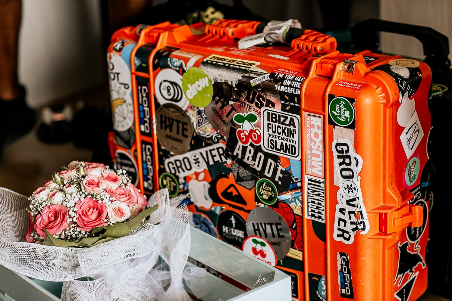 Colourful suitcase and wedding details in Ibiza
